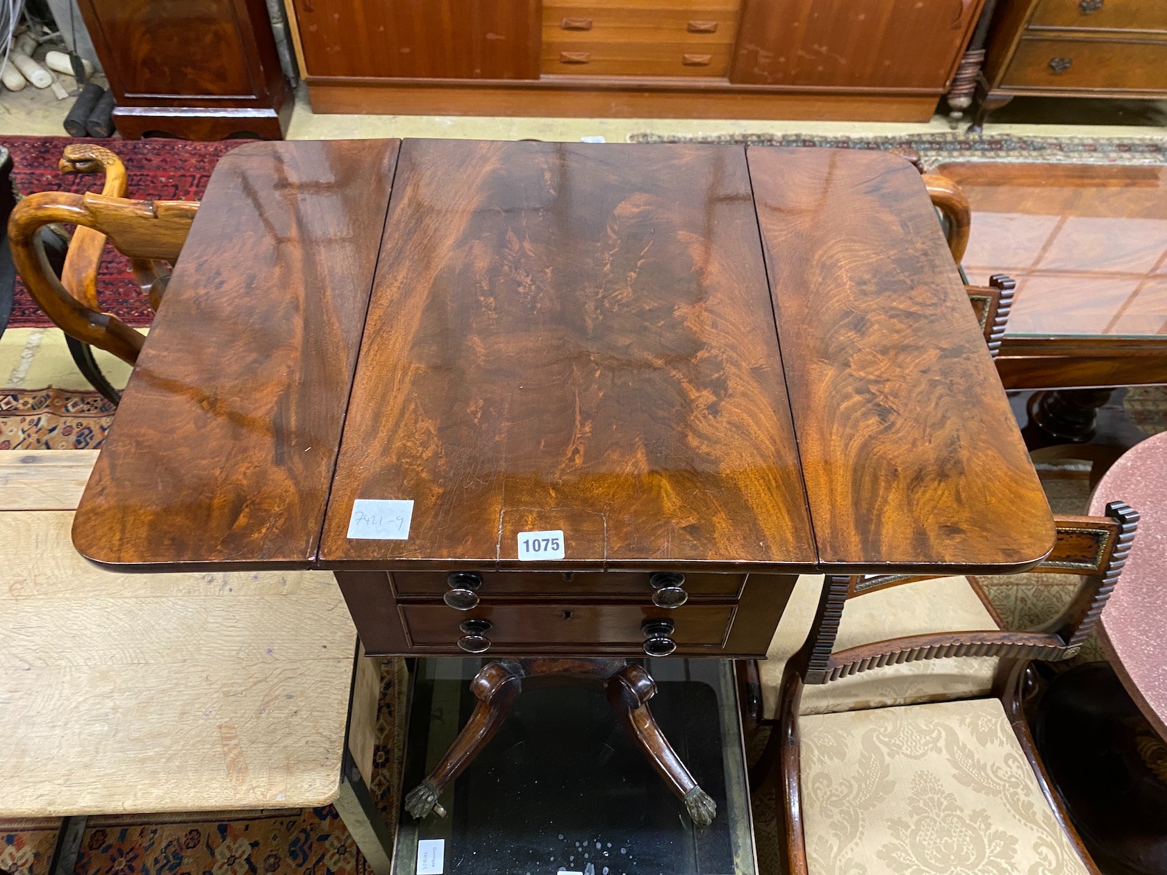 A Regency mahogany drop leaf work table, length 69cm extended, depth 48cm, height 71cm